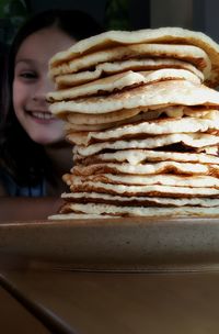 Close-up of woman eating food