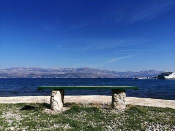 Scenic view of sea against blue sky