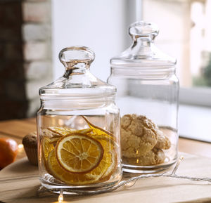Close-up of glass jar on table