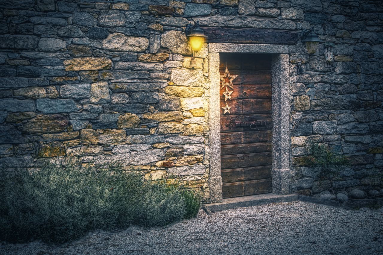 WEATHERED WALL OF OLD HOUSE