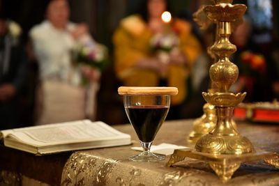 Close-up of wine glasses on table in restaurant