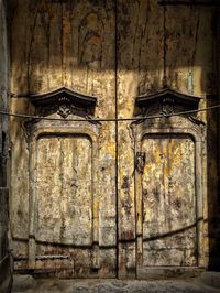 Closed wooden door of old building