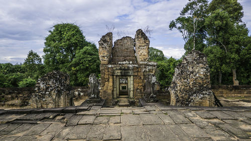 View of temple against cloudy sky