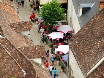 High angle view of sidewalk cafe and old buildings