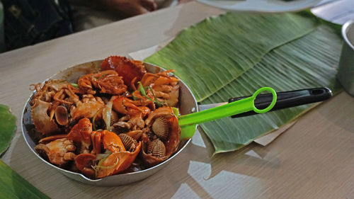 High angle view of meat in plate on table