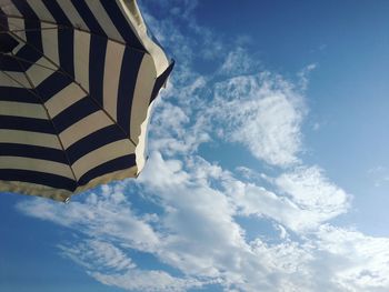 Low angle view of built structure against cloudy sky