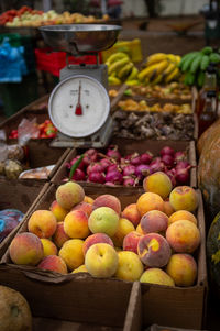 Delicious ripe peaches for sale at an urban street market