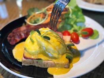 Close-up of breakfast served on table