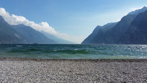 Scenic view of sea against blue sky