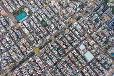 High angle view of street amidst buildings in city