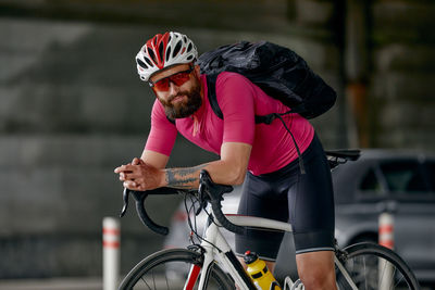 Low section of man riding bicycle