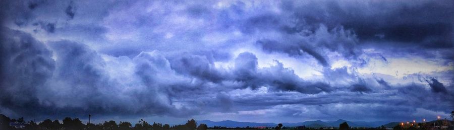 Panoramic view of storm clouds over landscape
