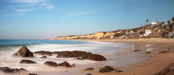 Panoramic view of beach against sky