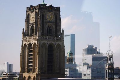 Low angle view of church against cloudy sky