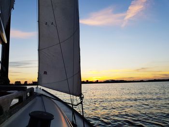 Close-up of sea against sky during sunset