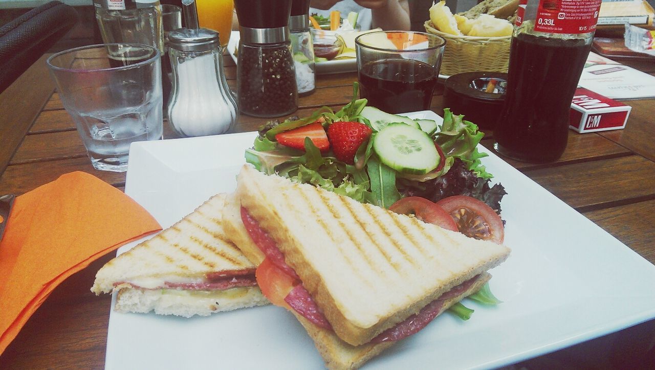 food and drink, food, freshness, indoors, ready-to-eat, table, still life, plate, healthy eating, serving size, indulgence, meal, slice, close-up, bread, sandwich, drinking glass, meat, drink