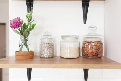 Nuts and seeds on white scandinavian kitchen