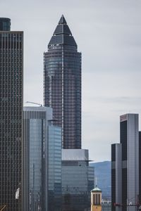 Skyscrapers in city against sky