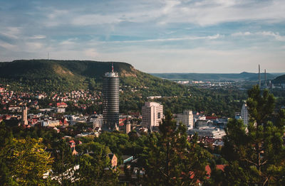 Aerial view of town against sky