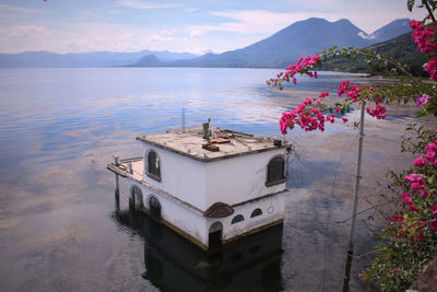 Scenic view of lake with mountains in background