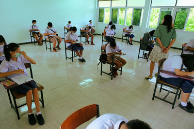 Group of people sitting on chair