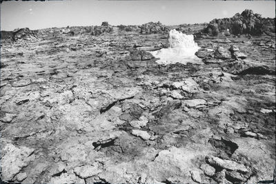 Rocks on land against sky