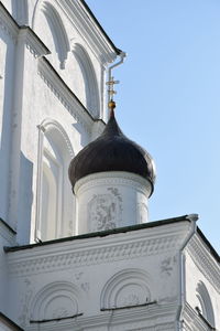 Low angle view of white building against clear sky