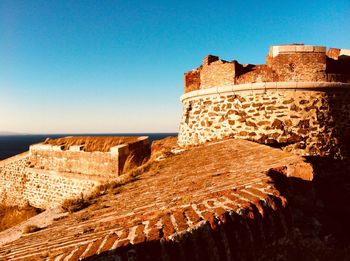 View of fort against blue sky