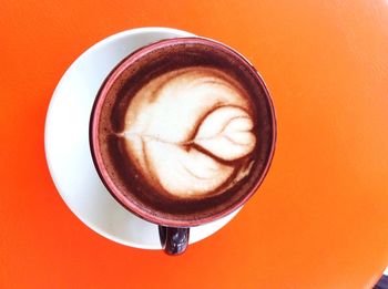 Directly above shot of cappuccino on table