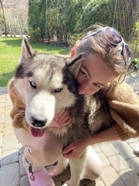 Portrait of woman with dog