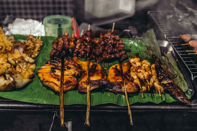 Close-up of various vegetables on barbecue grill
