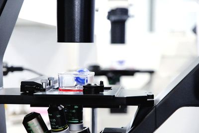 Close-up of machine part on table