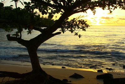 Scenic view of sea against sky at sunset