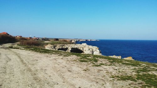 Scenic view of sea against clear sky