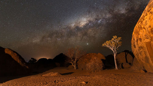 Scenic view of star field against sky at night