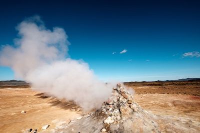 Scenic view of land against sky