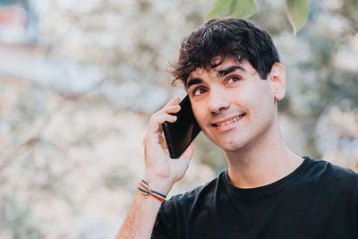 Young man using mobile phone