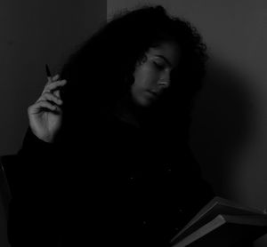 Portrait of woman looking at camera