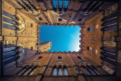 Directly below shot of torre del mangia