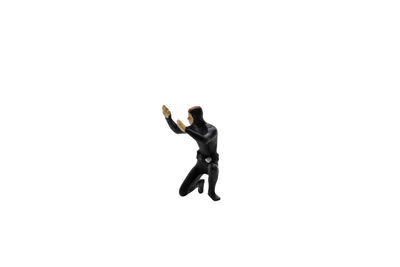 Full length of man jumping over white background