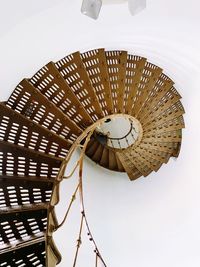 Low angle view of spiral staircase against sky