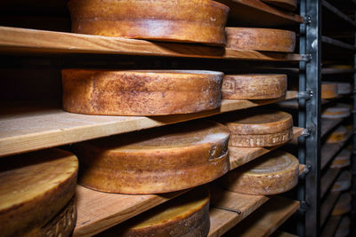 Forms of very mature bergamo cheese from northern italy