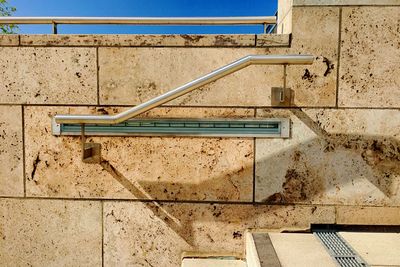 View of wall against blue sky