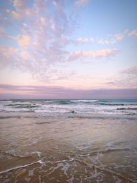 Scenic view of sea against sky at sunset