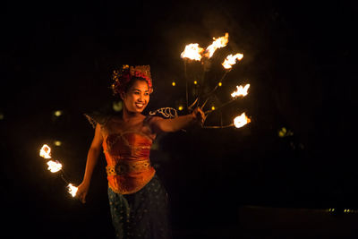 Portrait of woman at night