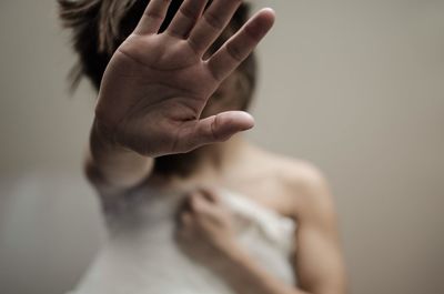 Woman gesturing stop sign