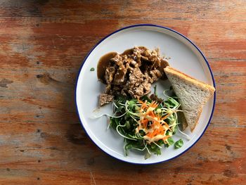 High angle view of breakfast served on table