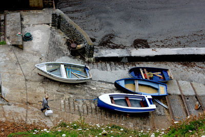 High angle view of rowboats on pier at harbor