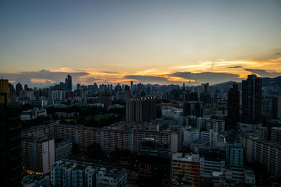 Cityscape against sky during sunset