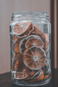 Close-up of glass jar on table